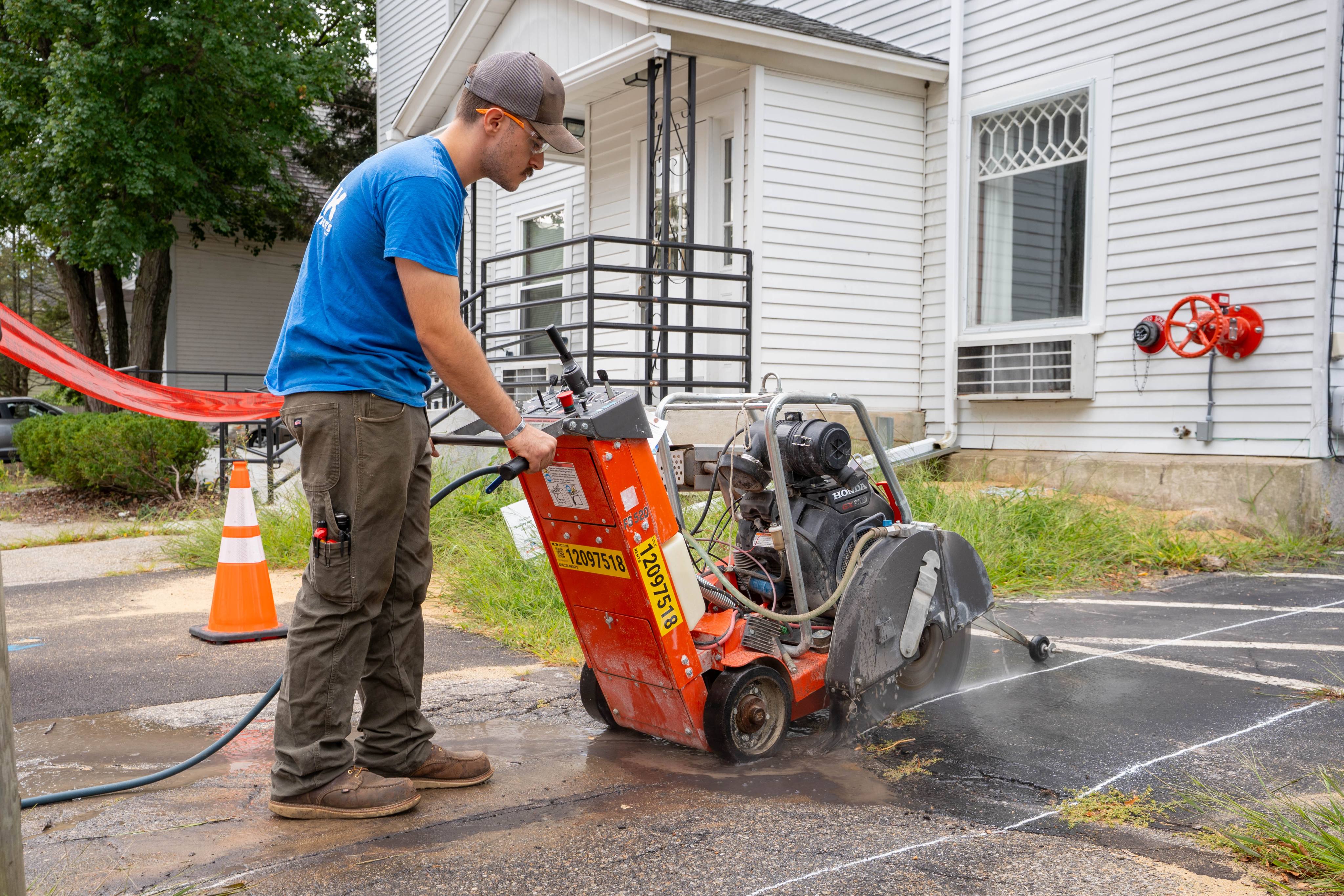 Saw-cutting pavement for the new underground electrical service