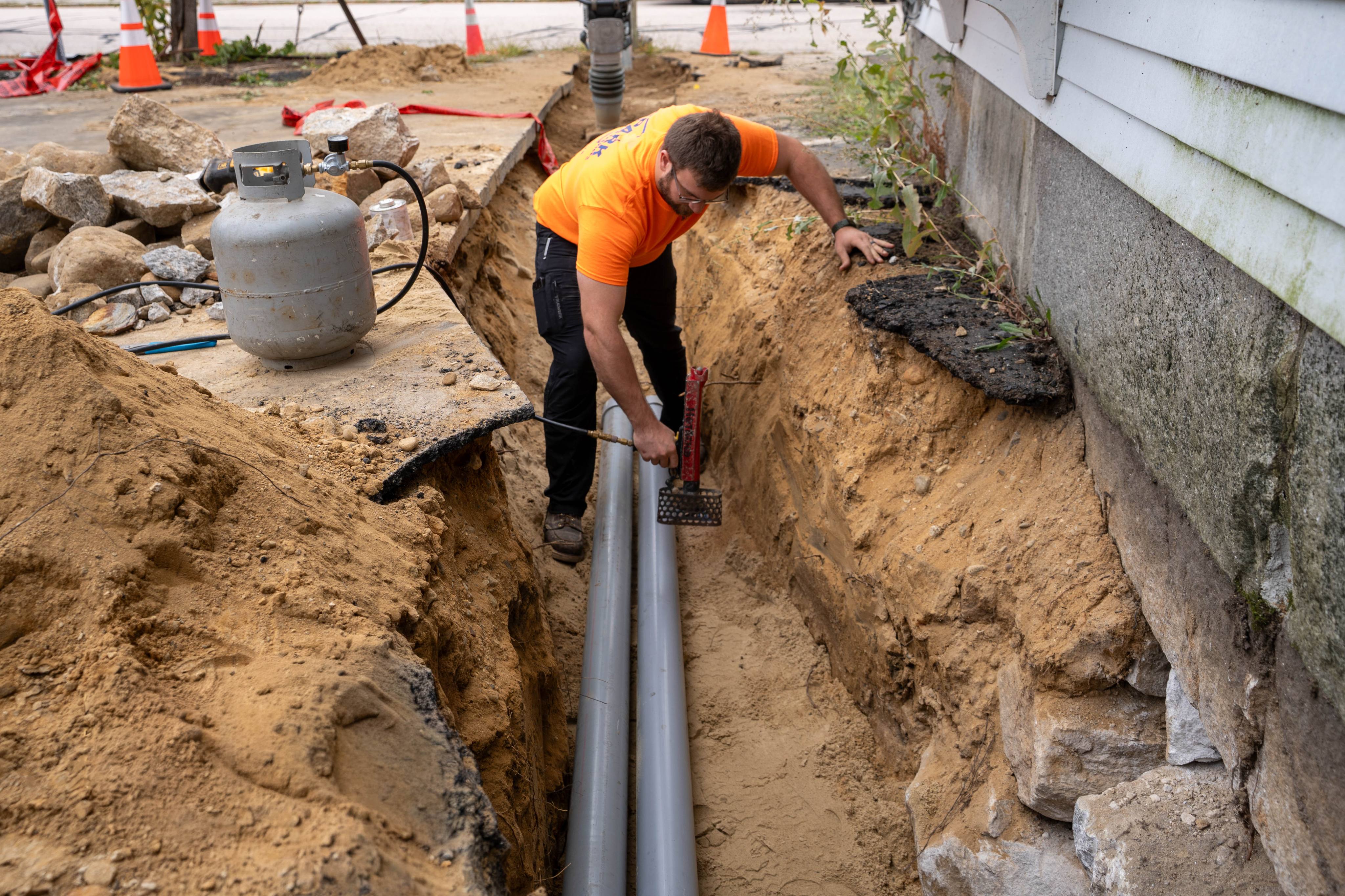 New underground conduit laid in the trench