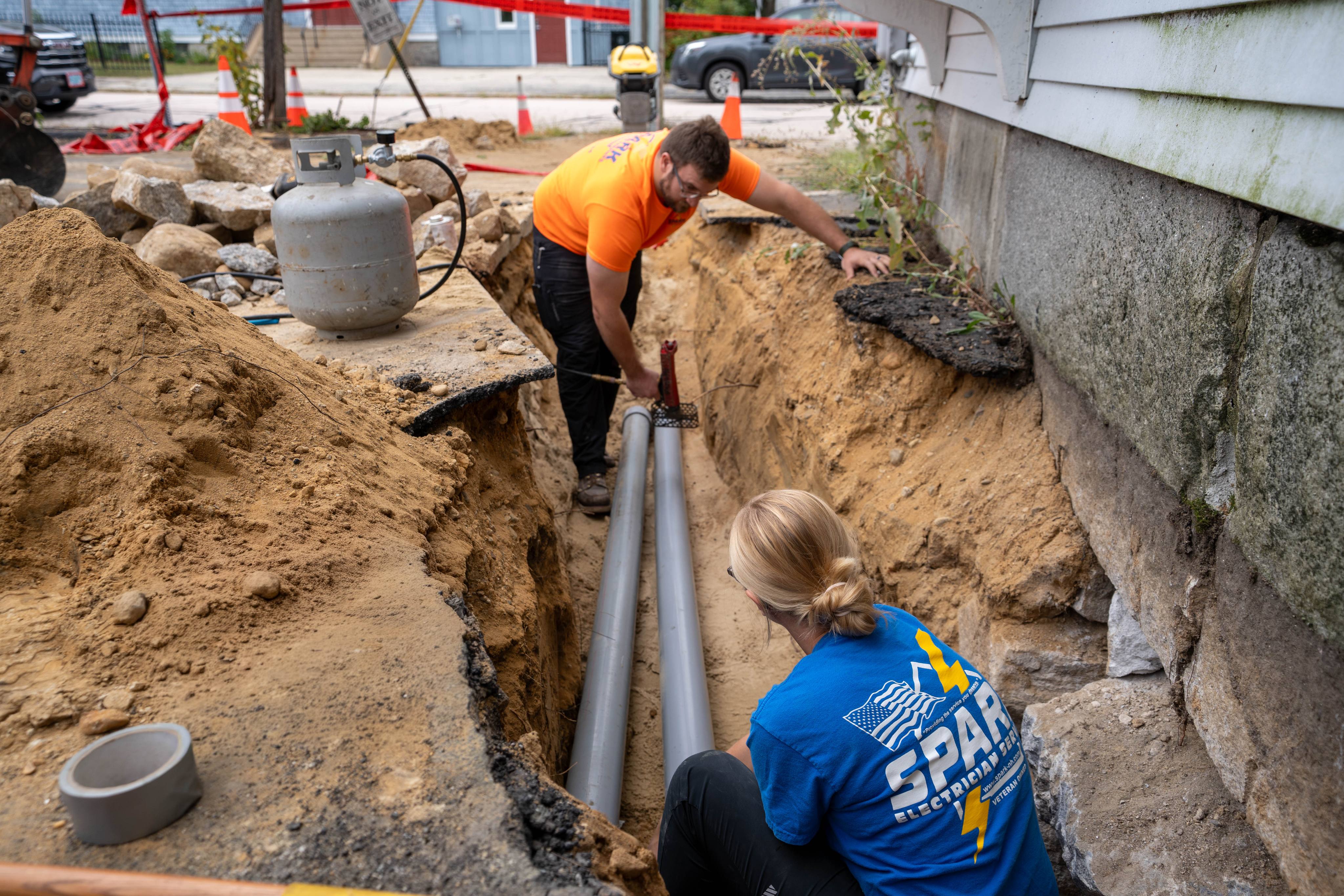 New underground conduit laid in the trench