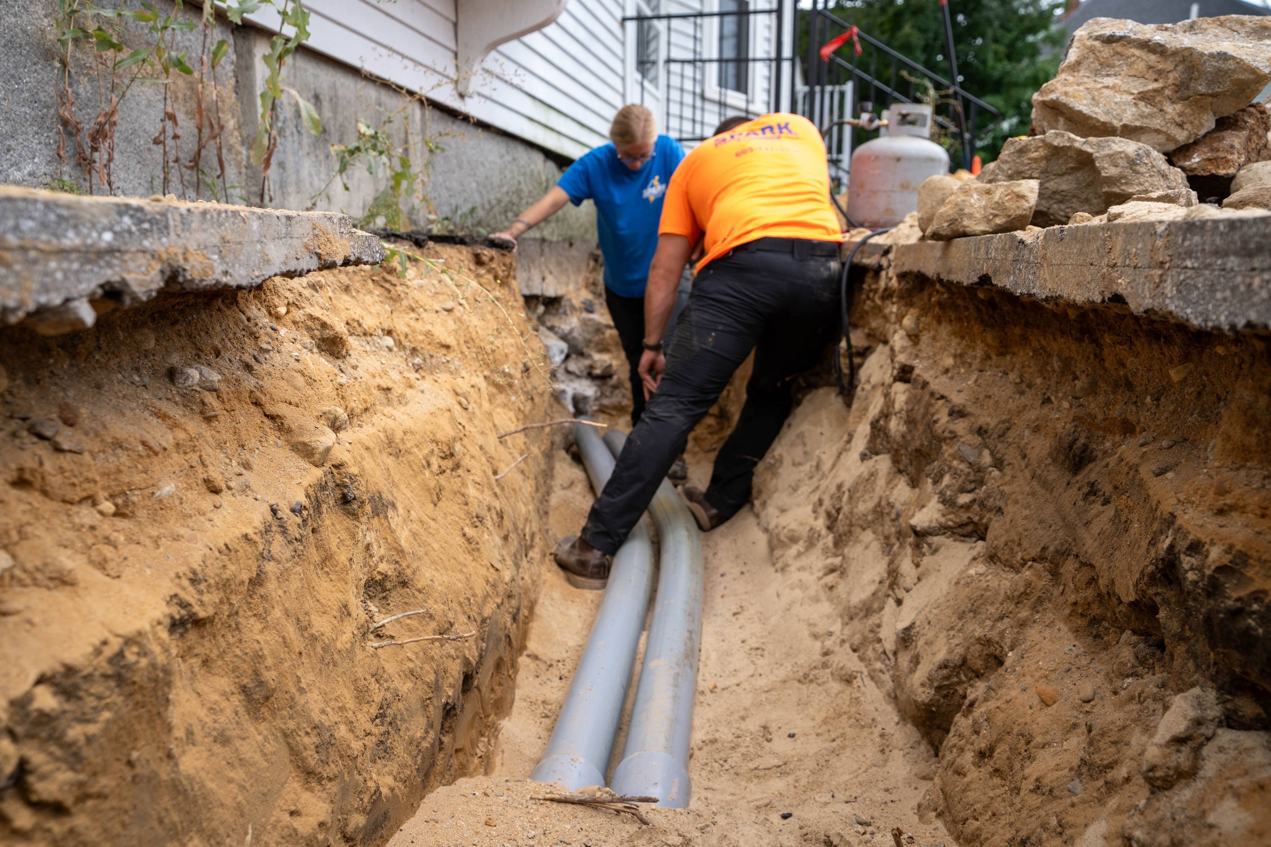 New underground conduit laid in the trench